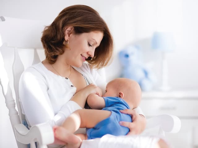 Photo of Breastfeeding Woman